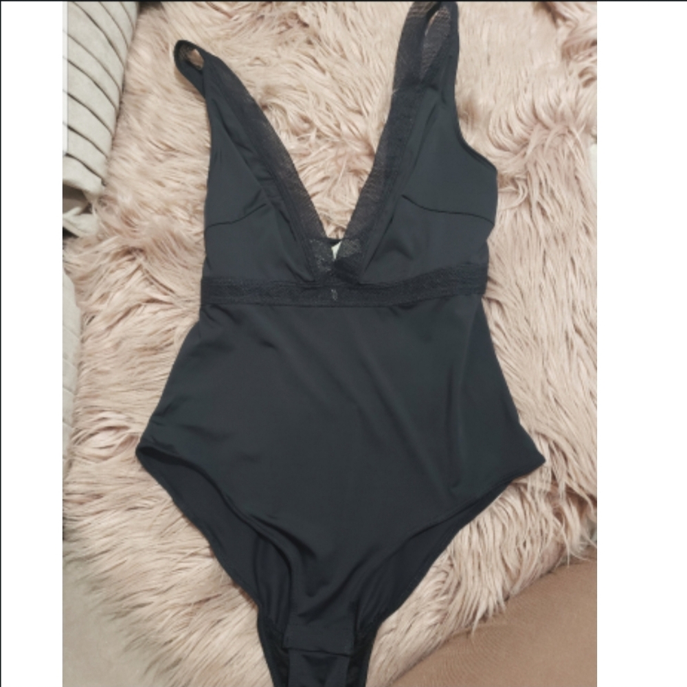 Black low neck body suit